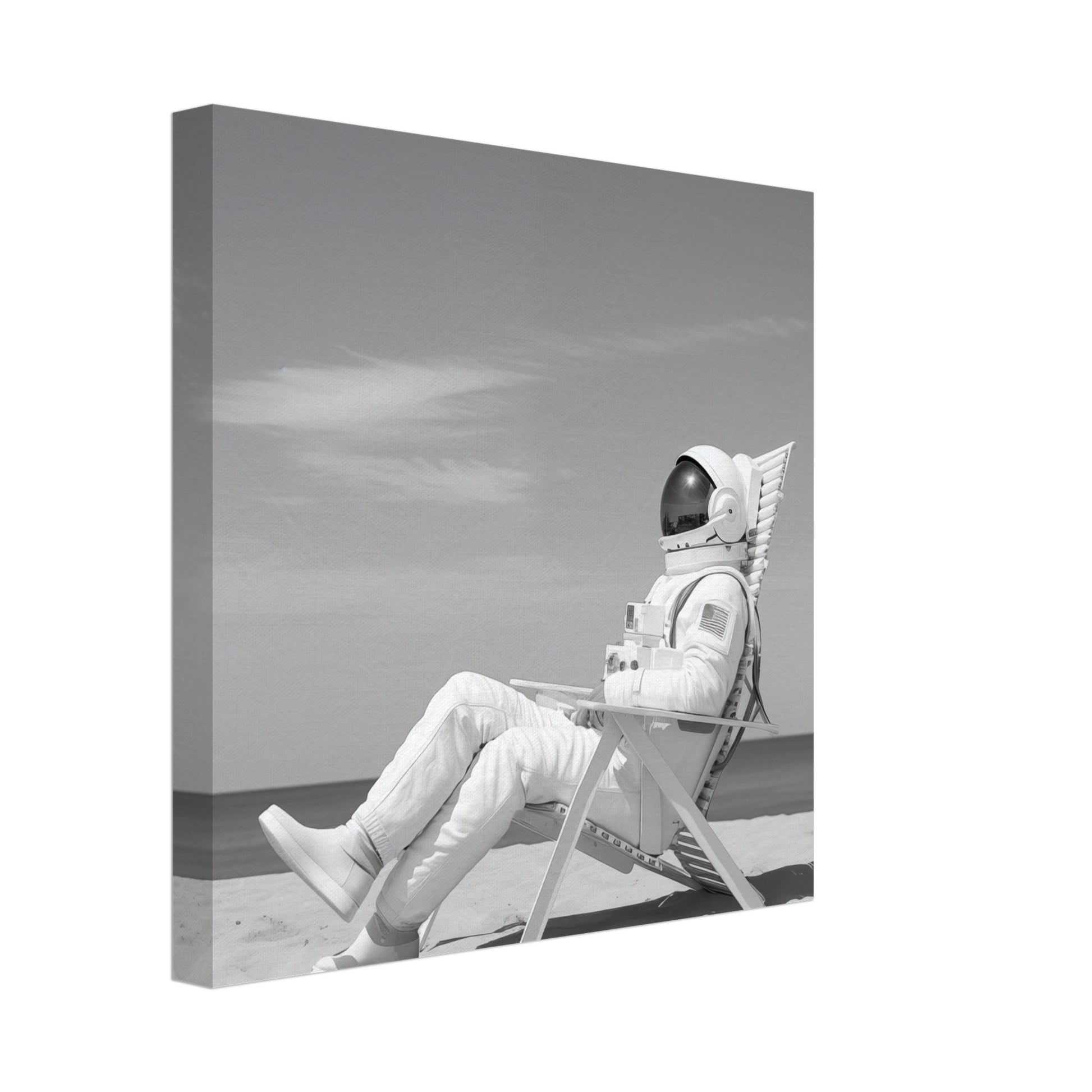 Leinwand „Ruhepause im All“ mit Astronaut im Liegestuhl auf karger Mondlandschaft in Schwarzweiß, 30x30 cm